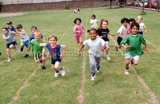 White children outnumber non-white children in the original of the photo used for the Race Convention 2006 website
