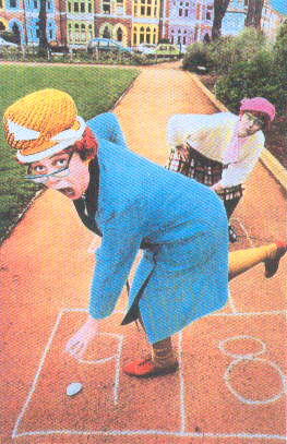 Playfully posing as lunatic women (not from Viz)