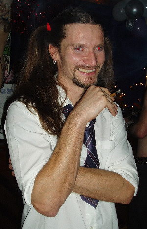 PC Mark Kennedy in pigtails, a photo no doubt released by his betrayed girlfriend
